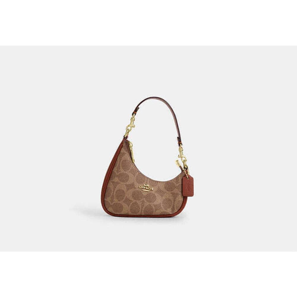 Coach Mini Twisted Teri Bag Charm In Signature Canvas Like New Authentic
